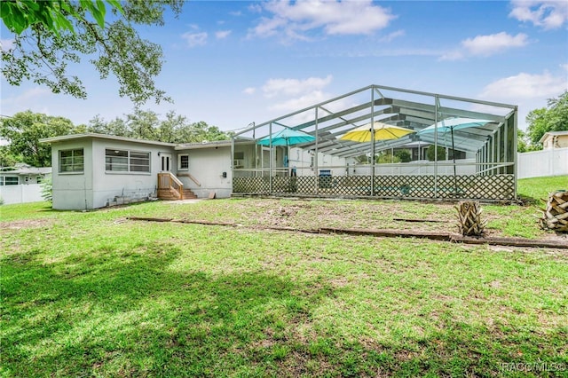 53 S Columbus St, Beverly Hills, FL 34465 - back of property featuring a lanai and stucco siding