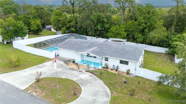 53 S Columbus St, Beverly Hills, FL 34465 - aerial view of property and surrounding area with a heavily wooded area