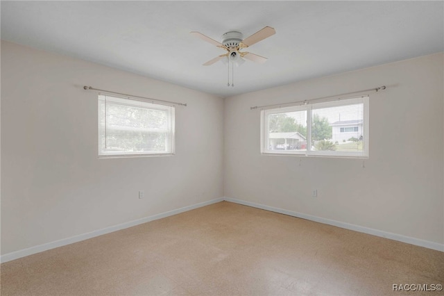 53 S Columbus St, Beverly Hills, FL 34465 - unfurnished room with light colored carpet and a ceiling fan