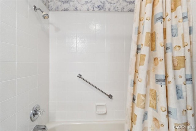 bathroom featuring shower / bath combo