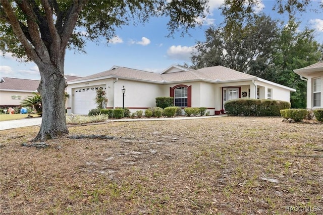 single story home featuring a garage