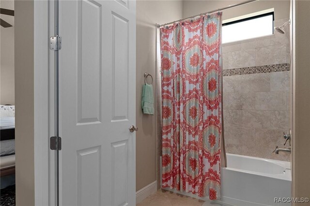 1576 N Eagle Ridge Path, Hernando, FL 34442 - bathroom featuring shower / bathtub combination with curtain and tile patterned flooring