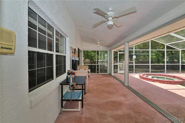 3670 W Cogwood Cir, Beverly Hills, FL 34465 - sunroom featuring a hot tub, ceiling fan, and lofted ceiling