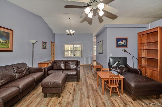 3670 W Cogwood Cir, Beverly Hills, FL 34465 - living room with light wood-style floors, ceiling fan, vaulted ceiling, a chandelier, and an office area