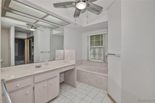 3670 W Cogwood Cir, Beverly Hills, FL 34465 - bathroom featuring a ceiling fan, a garden tub, vanity, and tile patterned floors