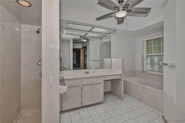 3670 W Cogwood Cir, Beverly Hills, FL 34465 - bathroom with a ceiling fan, a garden tub, vanity, tile patterned flooring, and walk in shower