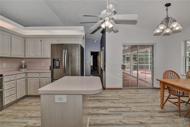 kitchen featuring stainless steel fridge with ice dispenser, light hardwood / wood-style flooring, ceiling fan with notable chandelier, and lofted ceiling