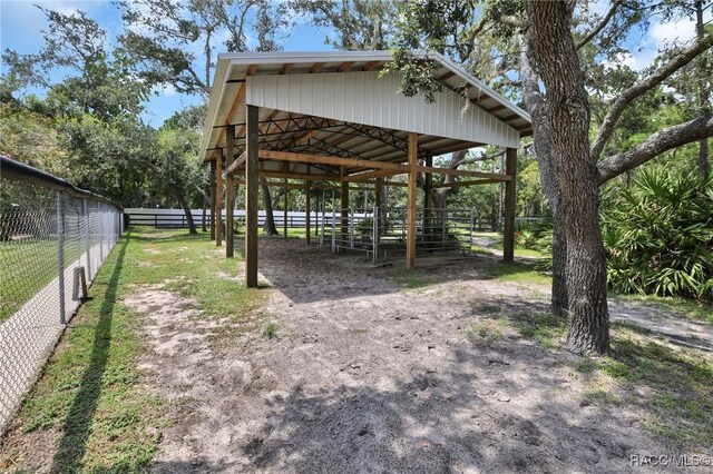 3670 W Cogwood Cir, Beverly Hills, FL 34465 - view of property's community with an exterior structure and an outdoor structure