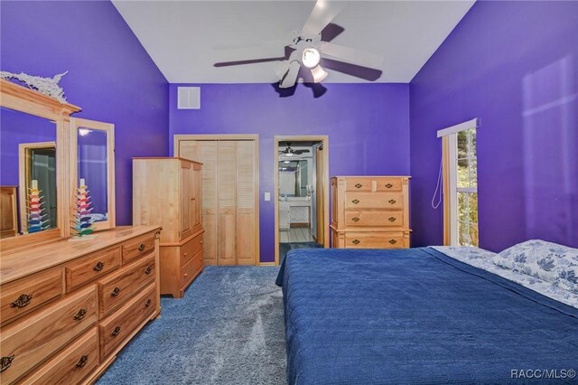 3670 W Cogwood Cir, Beverly Hills, FL 34465 - bedroom with vaulted ceiling, dark carpet, and a ceiling fan