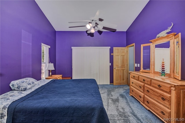 carpeted bedroom featuring ceiling fan and lofted ceiling