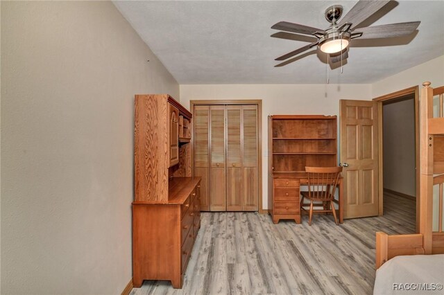 3670 W Cogwood Cir, Beverly Hills, FL 34465 - home office with light wood-type flooring, ceiling fan, and baseboards