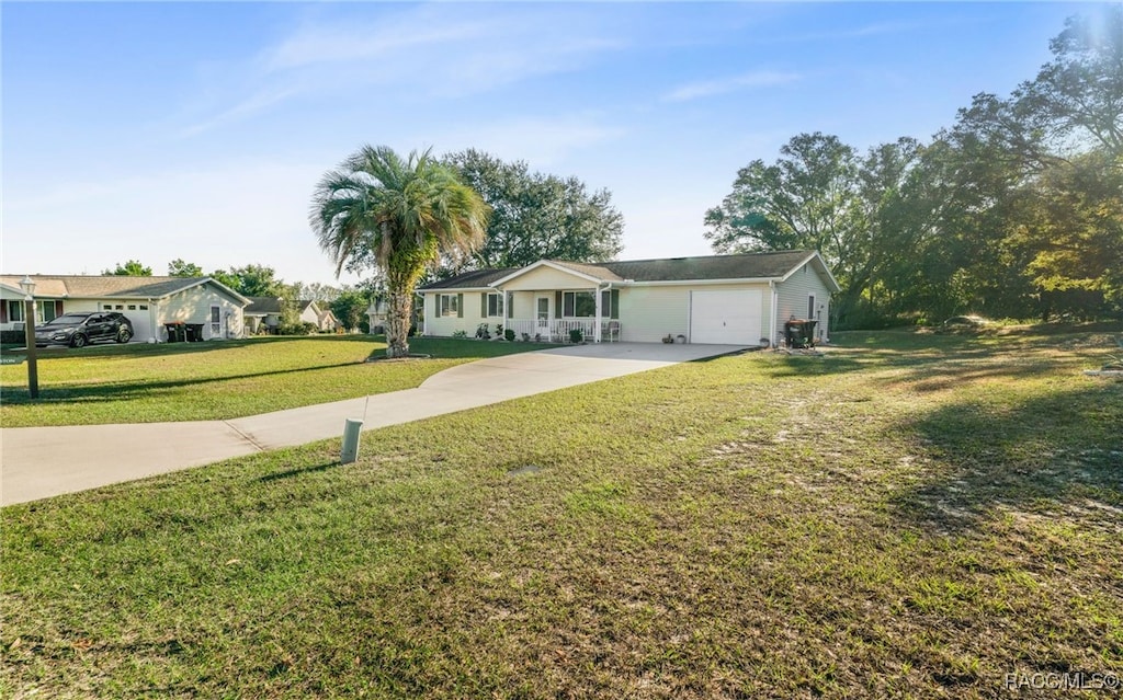 ranch-style house with a front yard and a garage