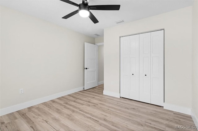 2828 E Celina St, Inverness, FL 34453 - unfurnished bedroom featuring light wood-type flooring, a closet, and ceiling fan