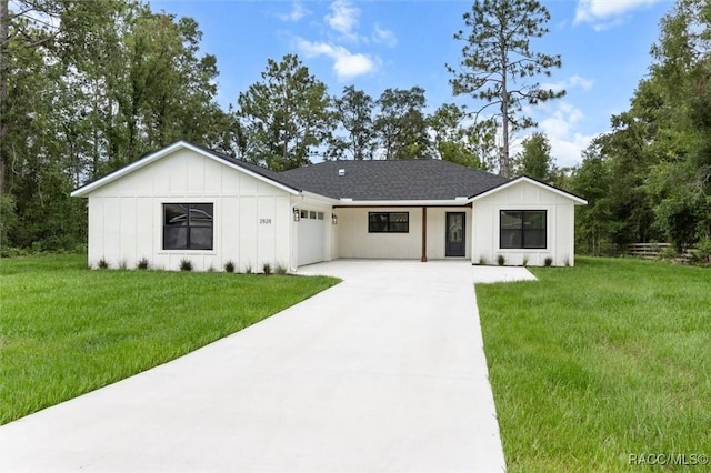 2828 E Celina St, Inverness, FL 34453 - modern farmhouse with driveway, board and batten siding, an attached garage, and a front lawn