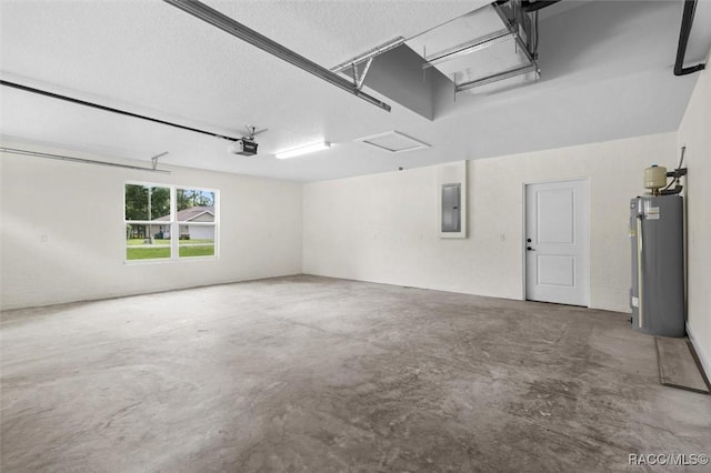 2828 E Celina St, Inverness, FL 34453 - garage with electric water heater, electric panel, and a garage door opener