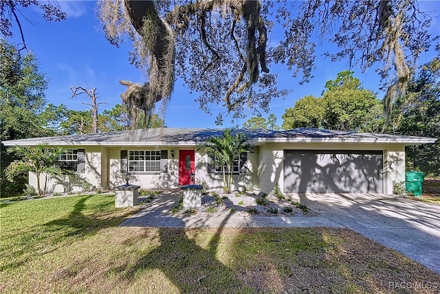 ranch-style house with a front yard and a garage