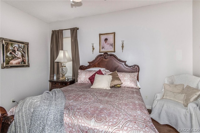 bedroom featuring hardwood / wood-style floors