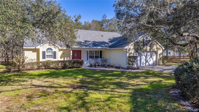 single story home featuring a front yard and a garage