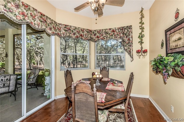 dining room with ceiling fan and hardwood / wood-style floors