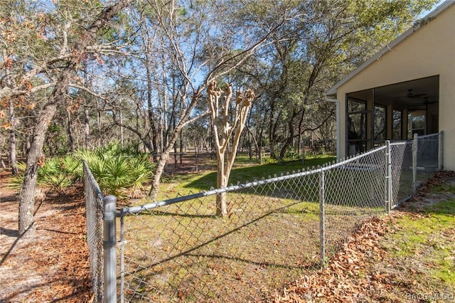 view of yard featuring a sunroom