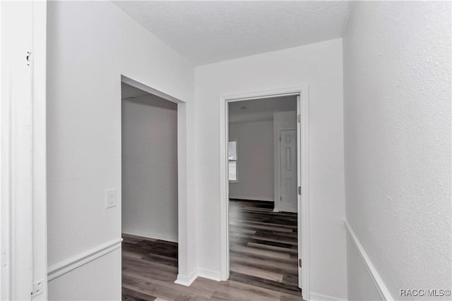 9019 E Gulf To Lake Hwy, Inverness, FL 34450 - corridor featuring wood finished floors and baseboards