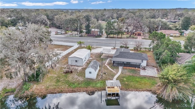 9019 E Gulf To Lake Hwy, Inverness, FL 34450 - aerial view of property and surrounding area featuring a nearby body of water