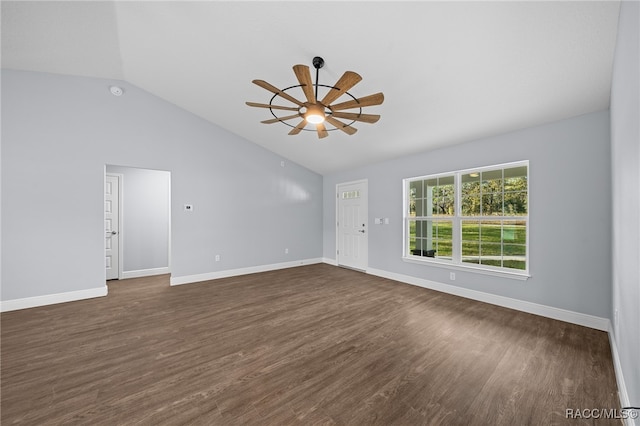 unfurnished room featuring ceiling fan, dark hardwood / wood-style flooring, and vaulted ceiling