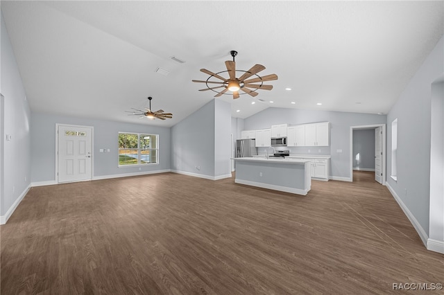 unfurnished living room with wood-type flooring, vaulted ceiling, ceiling fan, and sink