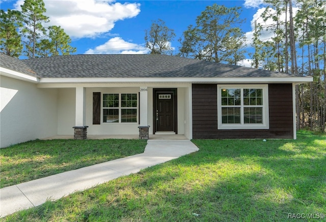 view of front of house featuring a front yard