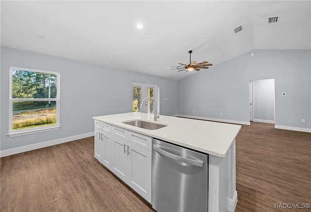 kitchen featuring sink, stainless steel dishwasher, hardwood / wood-style flooring, a healthy amount of sunlight, and white cabinetry