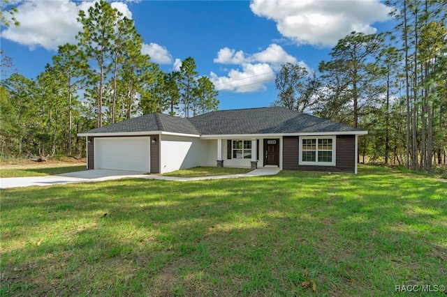 ranch-style home with a garage and a front lawn