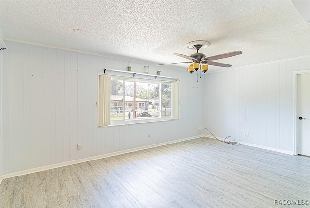 6176 W Pinedale Cir, Crystal River, FL 34429 - spare room with wood finished floors, a ceiling fan, and a textured ceiling