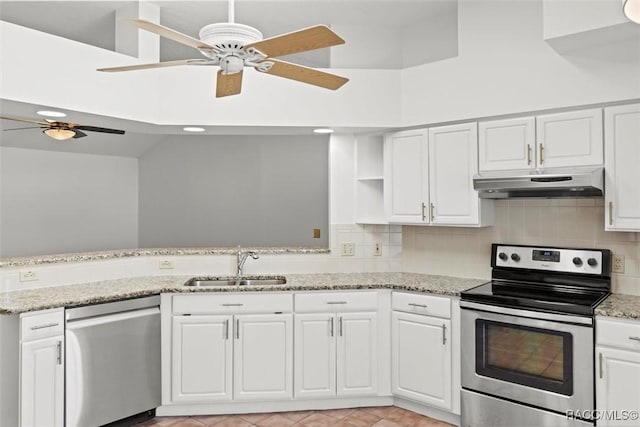 kitchen featuring white cabinetry, appliances with stainless steel finishes, and light stone countertops