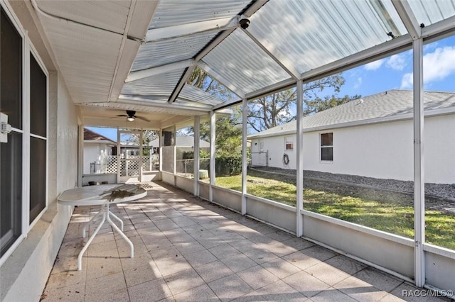 unfurnished sunroom featuring a wealth of natural light