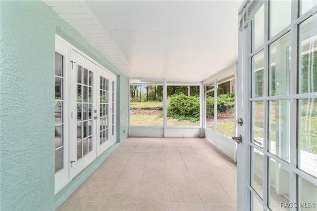 19028 SW 101st Pl, Dunnellon, FL 34432 - unfurnished sunroom with french doors and healthy amount of natural light