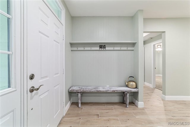 19028 SW 101st Pl, Dunnellon, FL 34432 - mudroom featuring wood tiled floors and baseboards