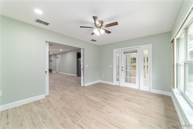 19028 SW 101st Pl, Dunnellon, FL 34432 - unfurnished room with ceiling fan, baseboards, light wood-style floors, and recessed lighting