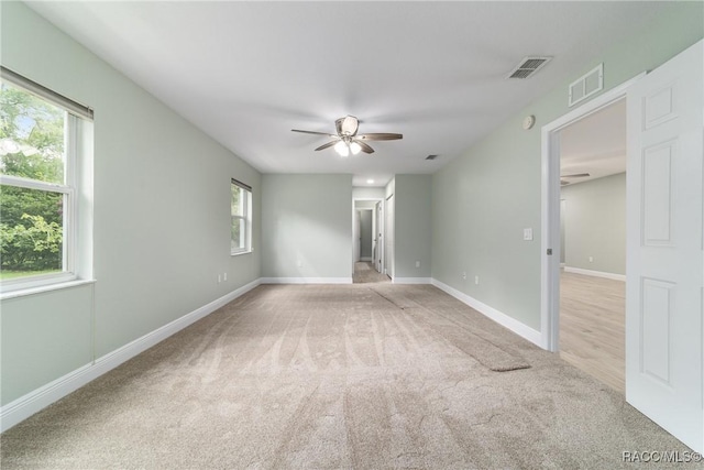 19028 SW 101st Pl, Dunnellon, FL 34432 - carpeted empty room featuring a ceiling fan and baseboards