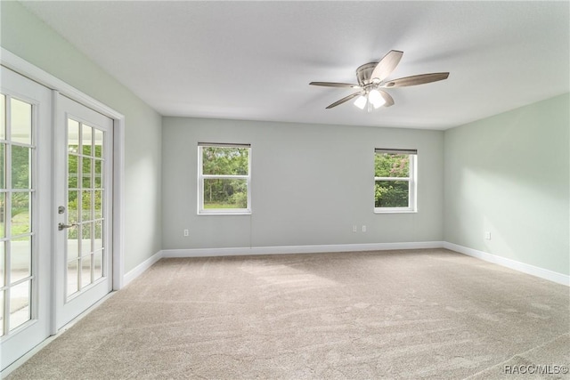 19028 SW 101st Pl, Dunnellon, FL 34432 - carpeted empty room with baseboards and ceiling fan