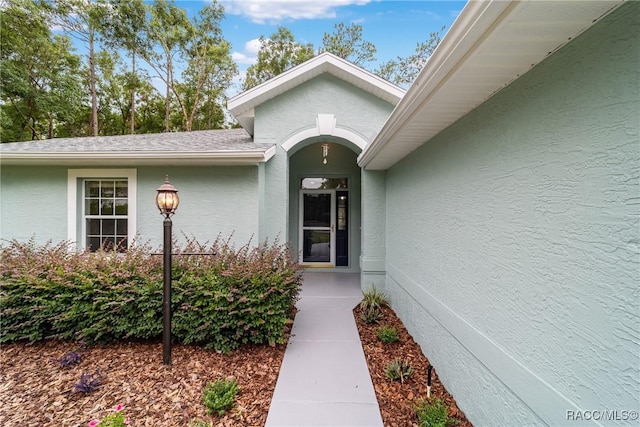 19028 SW 101st Pl, Dunnellon, FL 34432 - doorway to property with stucco siding