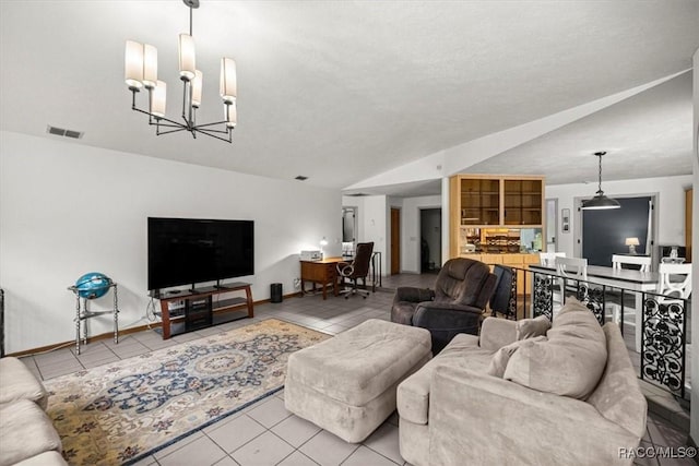 4357 N Indianhead Rd, Hernando, FL 34442 - living room with tile patterned floors and a chandelier