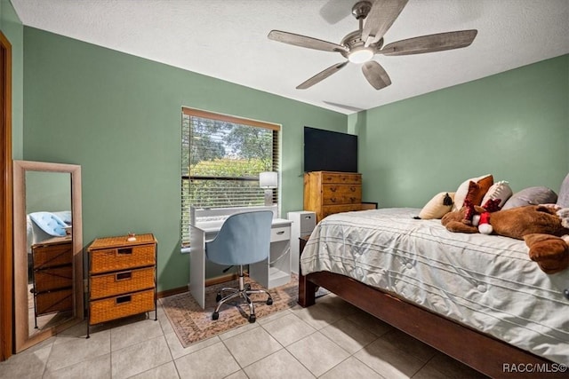 4357 N Indianhead Rd, Hernando, FL 34442 - bedroom with tile patterned flooring, a ceiling fan, and a textured ceiling