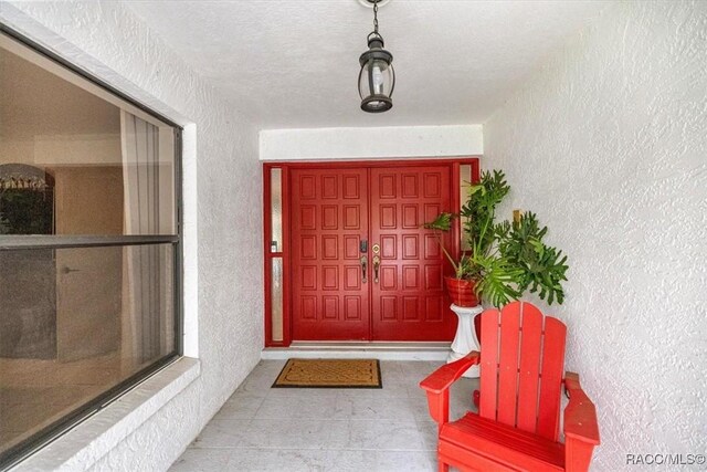 4357 N Indianhead Rd, Hernando, FL 34442 - doorway to property featuring stucco siding