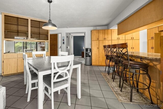 4357 N Indianhead Rd, Hernando, FL 34442 - dining room with light tile patterned flooring