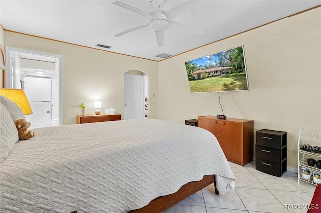 bedroom with ceiling fan and light tile patterned flooring