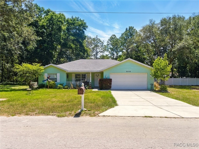 8599 N Messina Loop, Crystal River, FL 34428 - ranch-style home with an attached garage and concrete driveway
