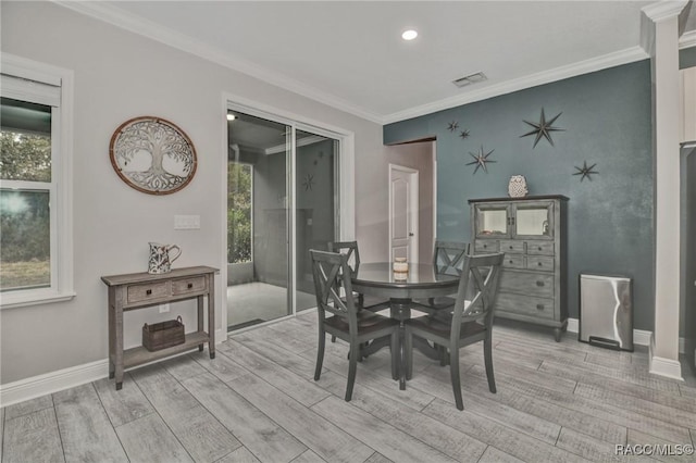 dining room featuring ornamental molding