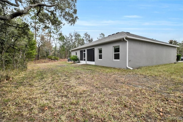 exterior space with a lawn