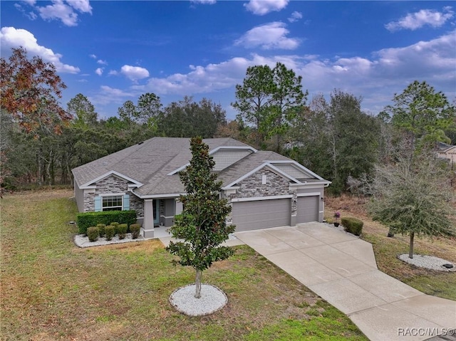 ranch-style home featuring a garage and a front lawn