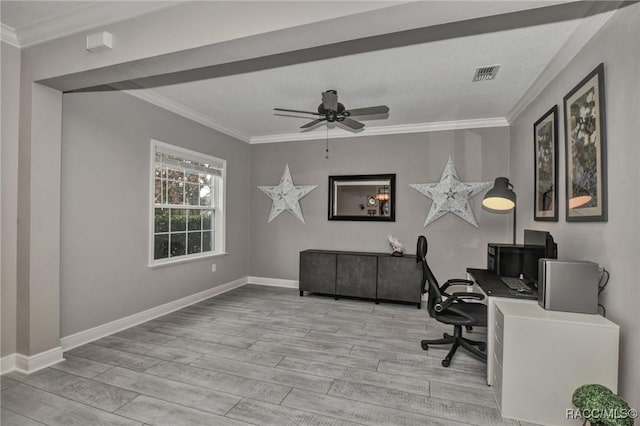 office space with crown molding, ceiling fan, and light hardwood / wood-style flooring